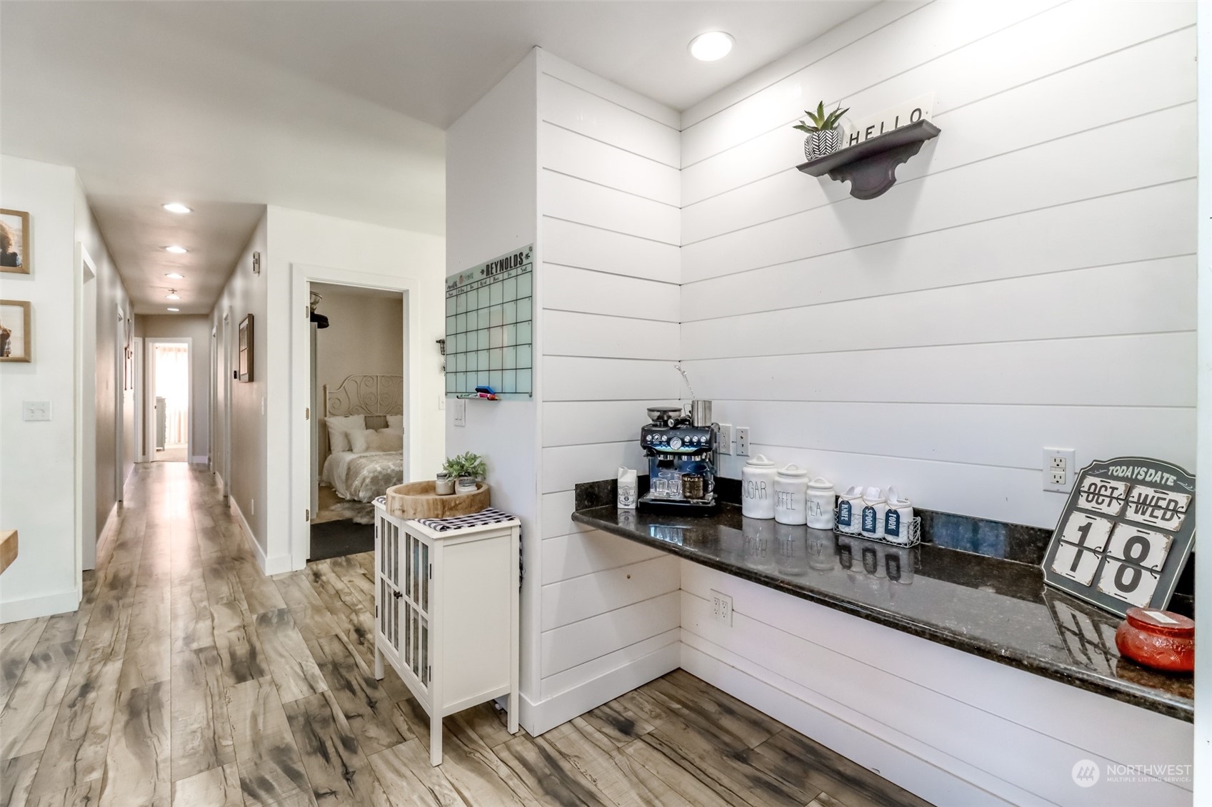 1355 McHugh Avenue Enumclaw, WA 98022 - Photo 10 of 35 a kitchen with granite countertop white cabinets and white appliances