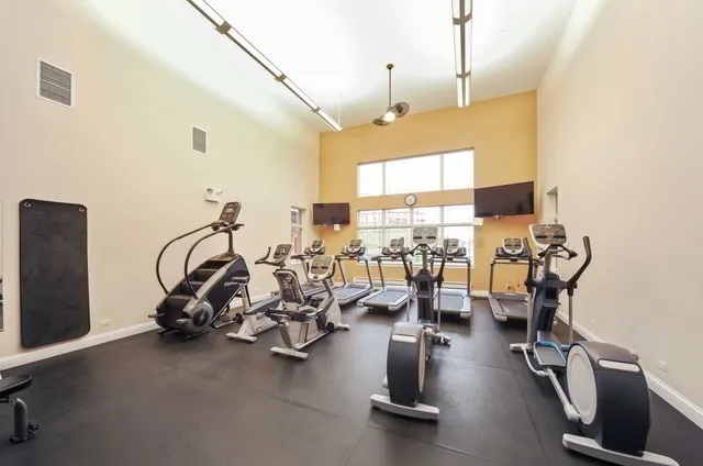 a view of a room with gym equipment
