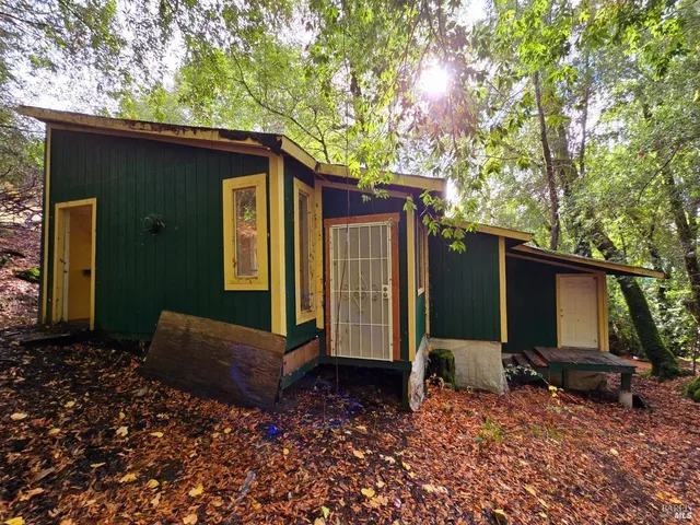 a living room with furniture window and wooden floor