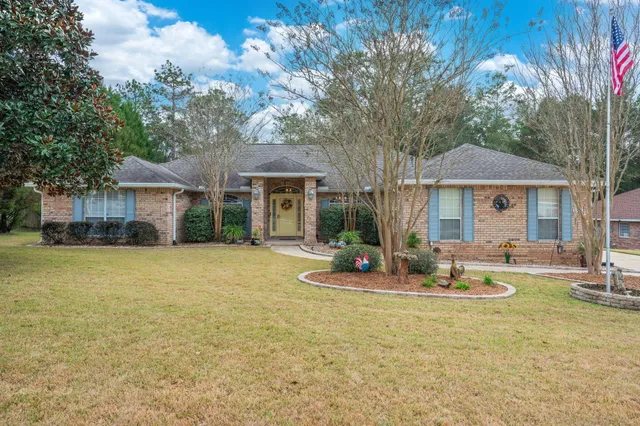 a house that has sitting area in front of it