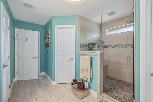 a view of a bathroom with shower