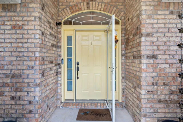 a view of a brick house with a door
