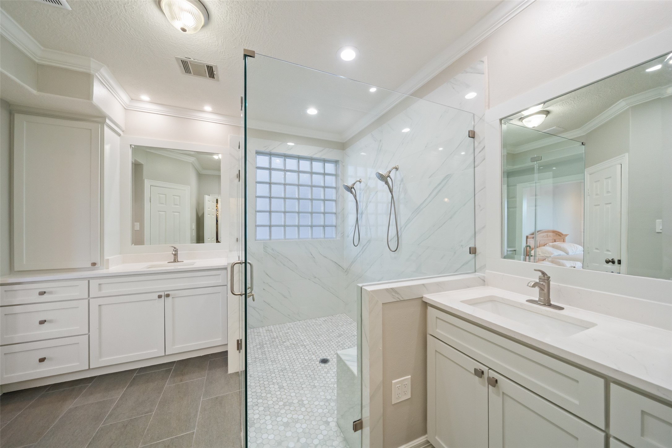 12200 Pebble View Drive Conroe, TX 77304 - Photo 17 of 43 a bathroom with a double vanity sink mirror and double