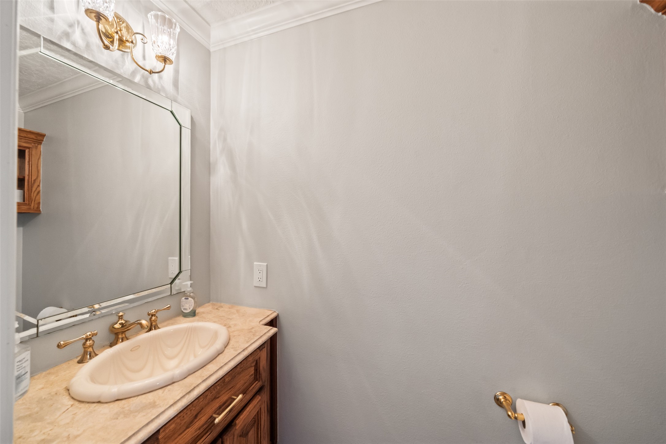 12200 Pebble View Drive Conroe, TX 77304 - Photo 18 of 43 a bathroom with a sink and a mirror