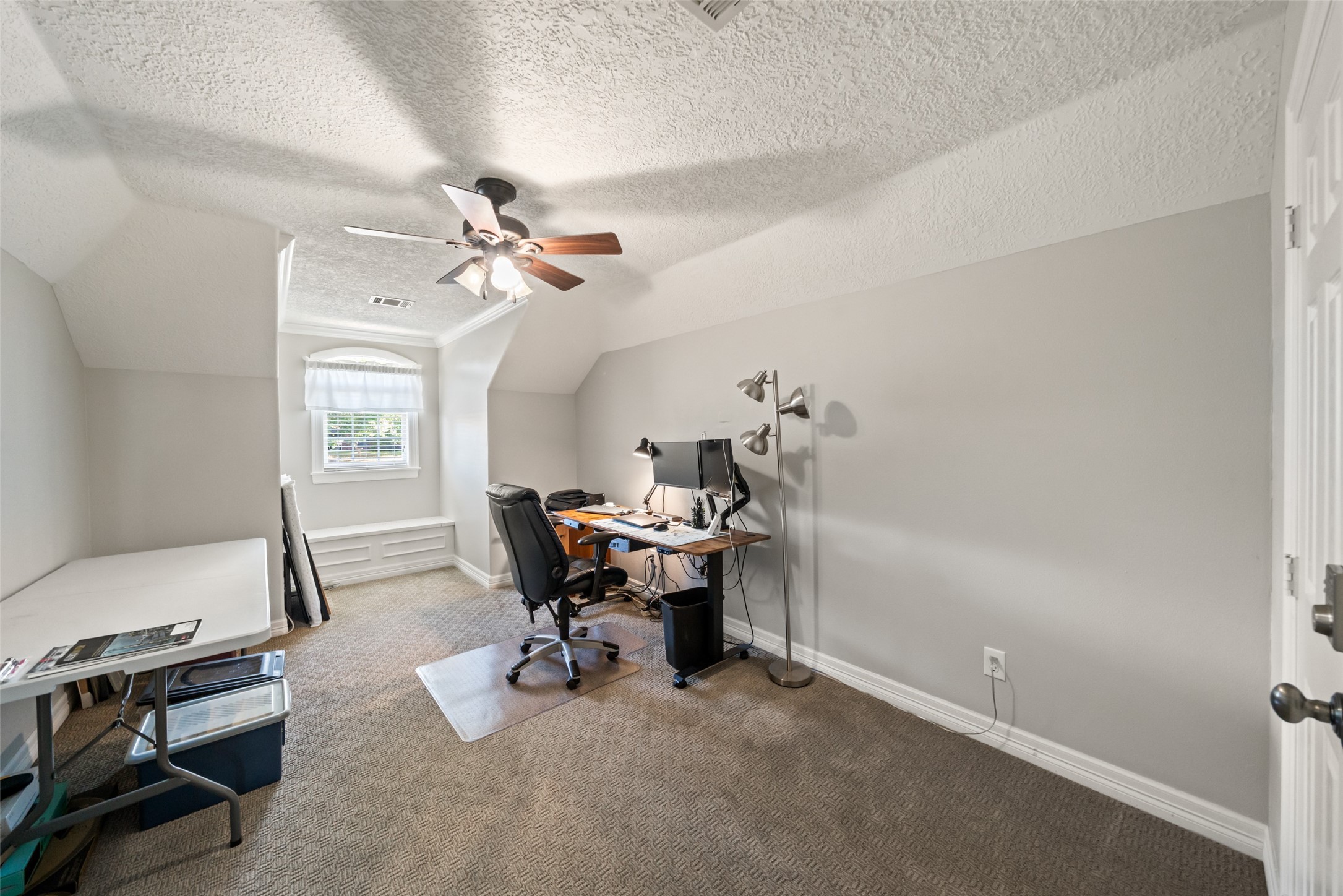 12200 Pebble View Drive Conroe, TX 77304 - Photo 29 of 43 a view of a workspace with furniture and a window