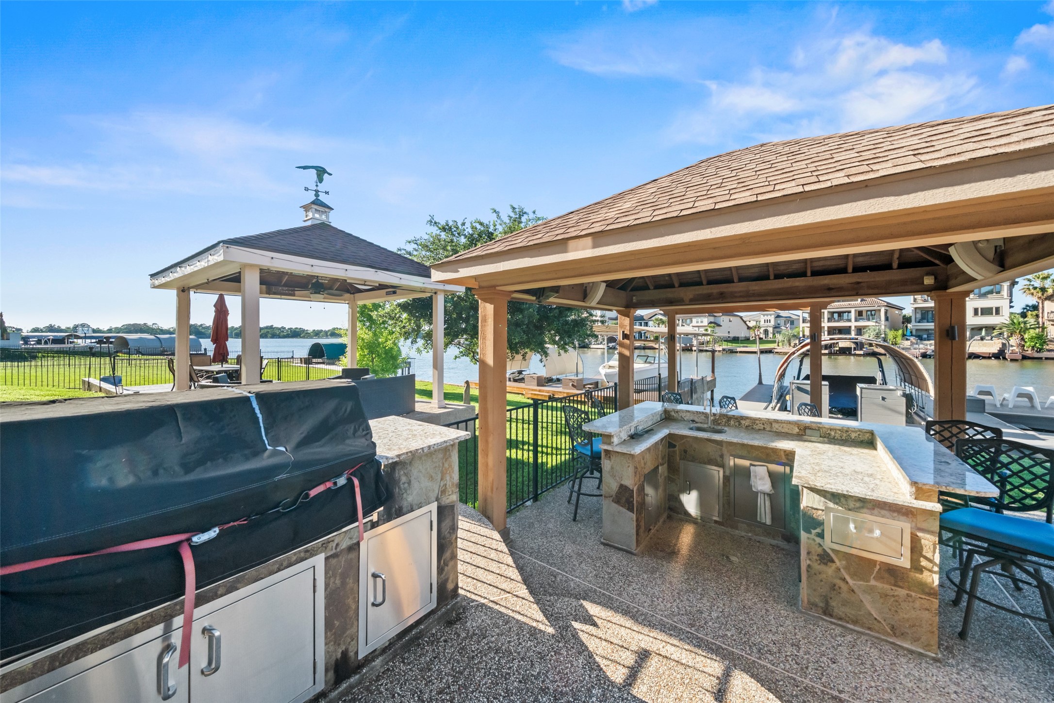 12200 Pebble View Drive Conroe, TX 77304 - Photo 37 of 43 a view of swimming pool with outdoor seating and barbeque oven