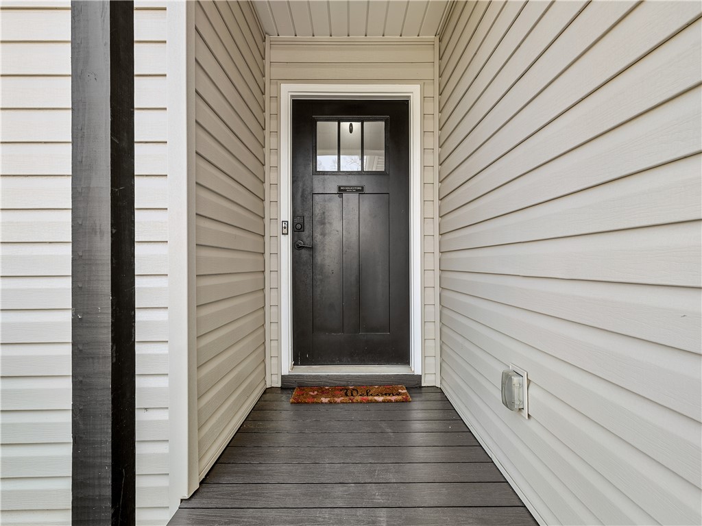2520 Linmar Circle Anderson, SC 29621 - Photo 7 of 50 A welcoming entry invites with a classic front door framed by horizontal siding.
