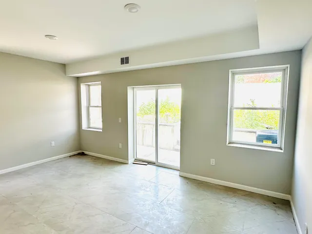 an empty room with windows