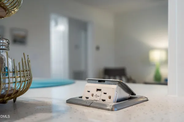 a bathroom with a toilet and a vanity