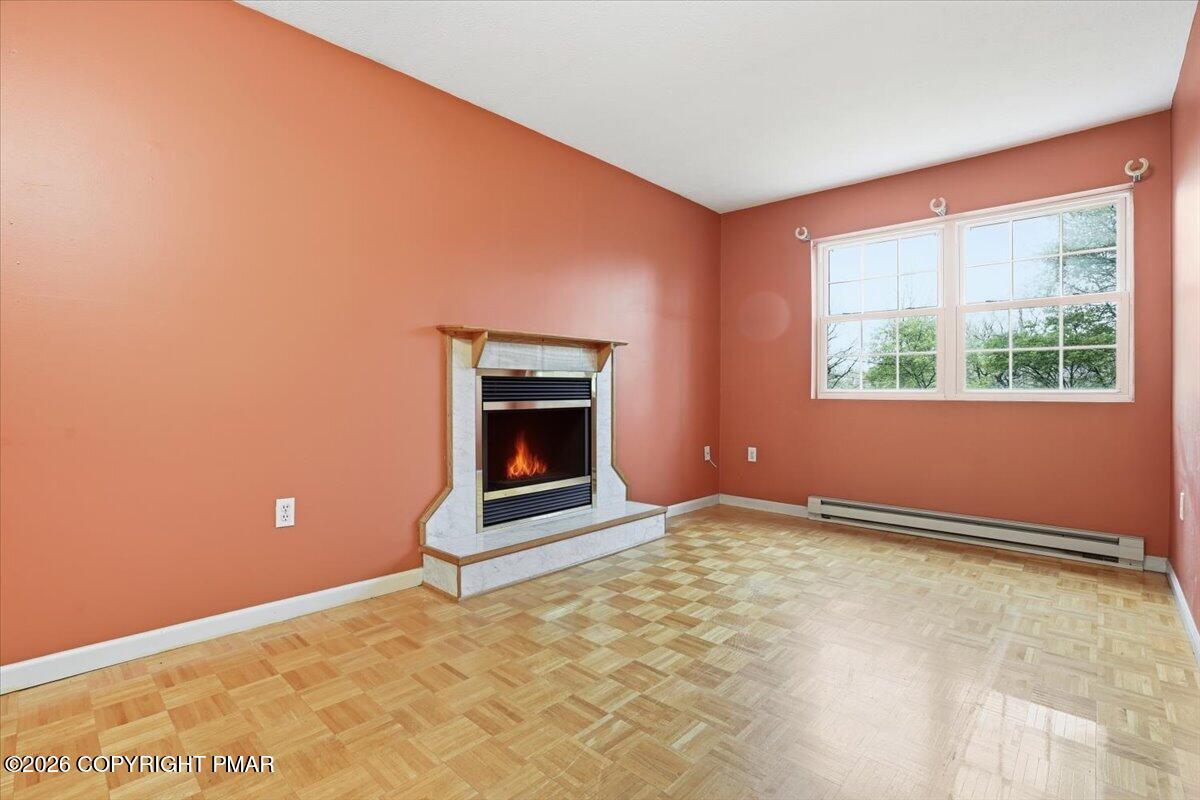 349 Bumble Bee Pass Cresco, PA 18326 - Photo 14 of 31 Primary bedrm w/ fireplace