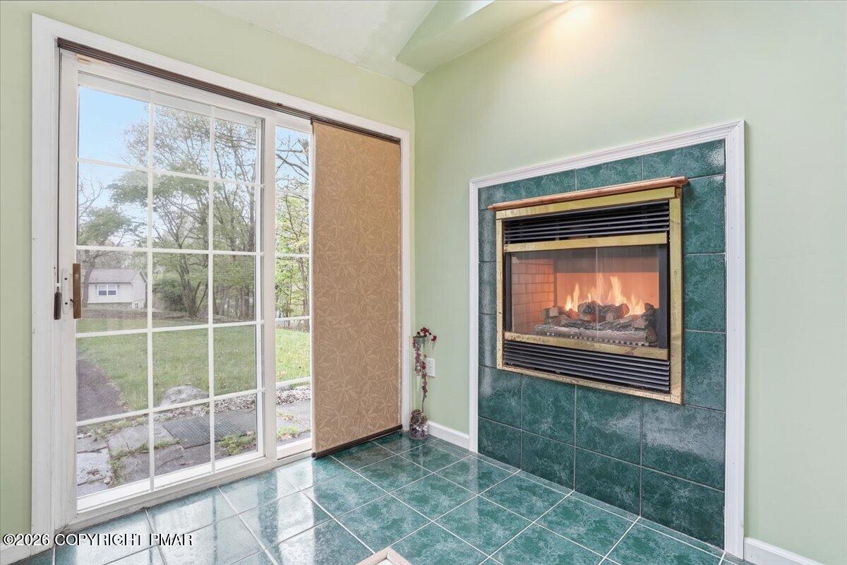 349 Bumble Bee Pass Cresco, PA 18326 - Photo 15 of 31 Gym & Jacuzzi rm w/ fireplace