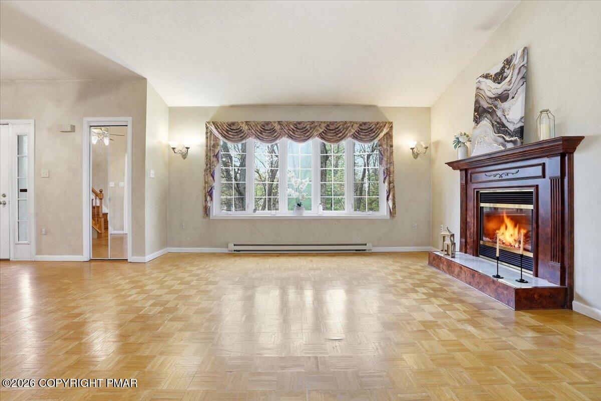 349 Bumble Bee Pass Cresco, PA 18326 - Photo 4 of 31 Living room with fireplace