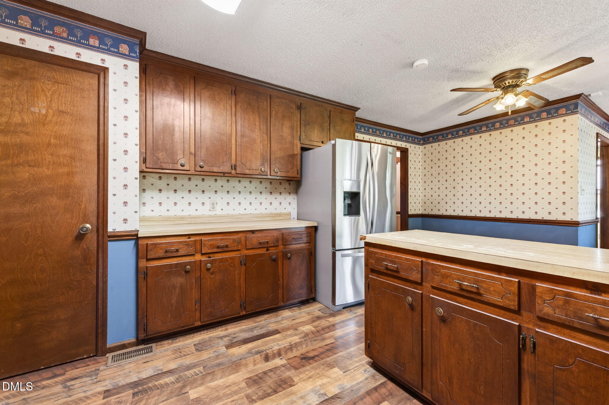 350 Grantham School Road Goldsboro, NC 27530 - Photo 11 of 49 a kitchen with stainless steel appliances granite countertop a refrigerator a sink dishwasher and wooden cabinets