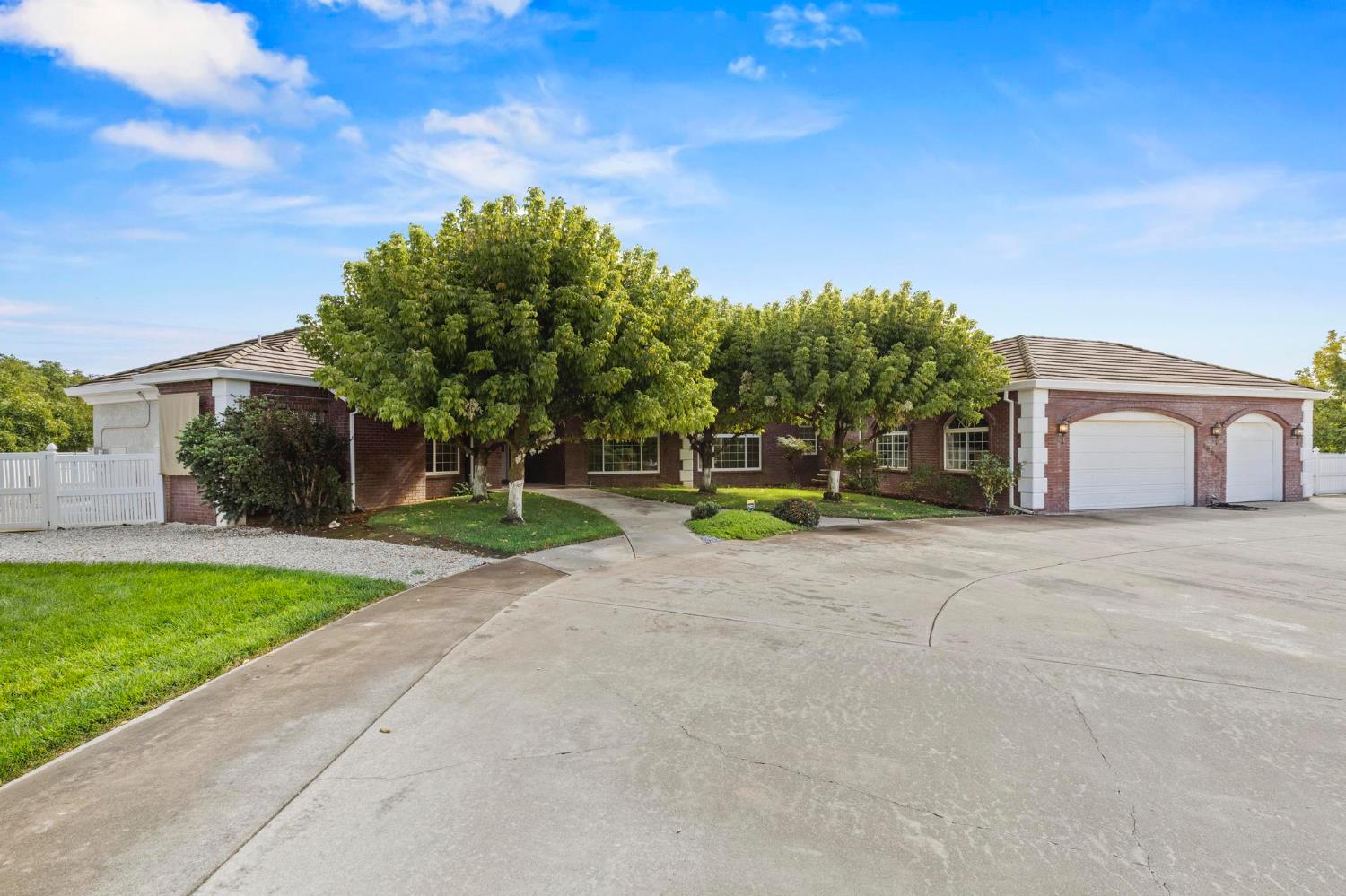 10963 Metteer Road Live Oak, CA 95953 - Photo 11 of 73 a view of a house with backyard and a tree