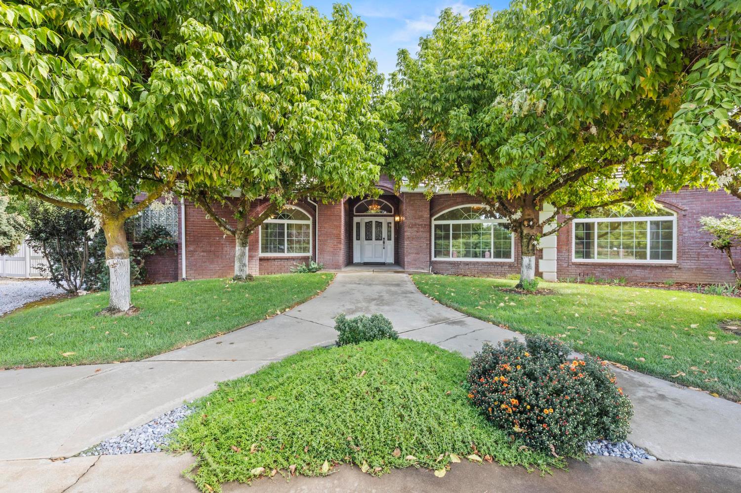 10963 Metteer Road Live Oak, CA 95953 - Photo 12 of 73 front view of a house with a yard