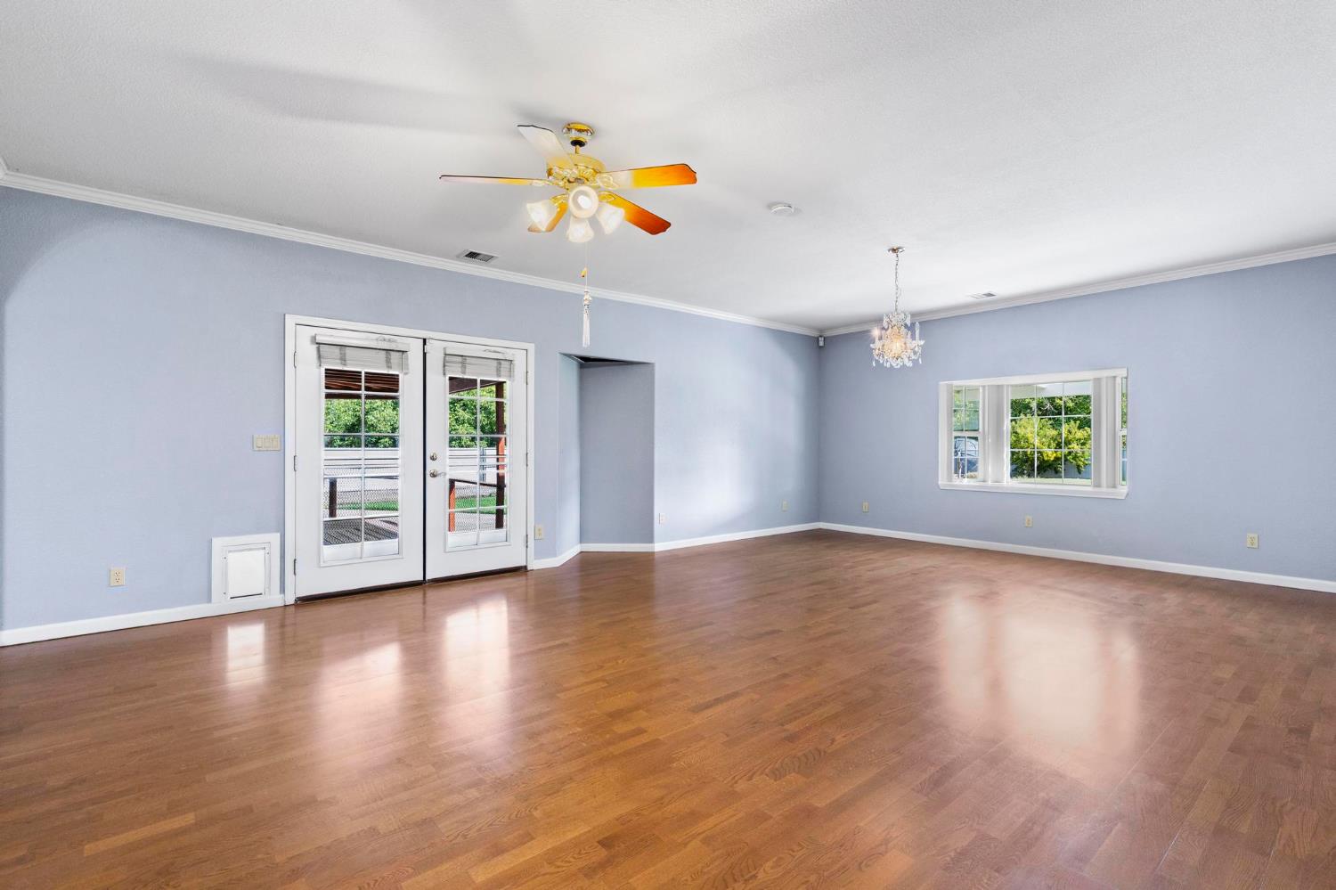 10963 Metteer Road Live Oak, CA 95953 - Photo 34 of 73 a view of an empty room with wooden floor and a window
