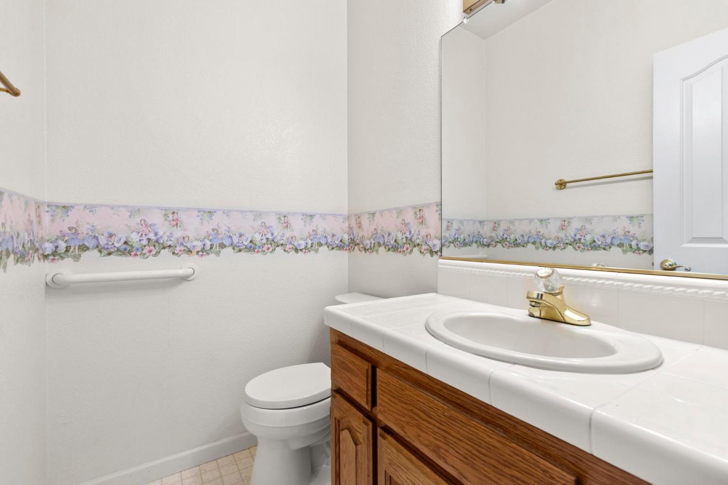 10963 Metteer Road Live Oak, CA 95953 - Photo 42 of 73 a bathroom with a sink and a toilet