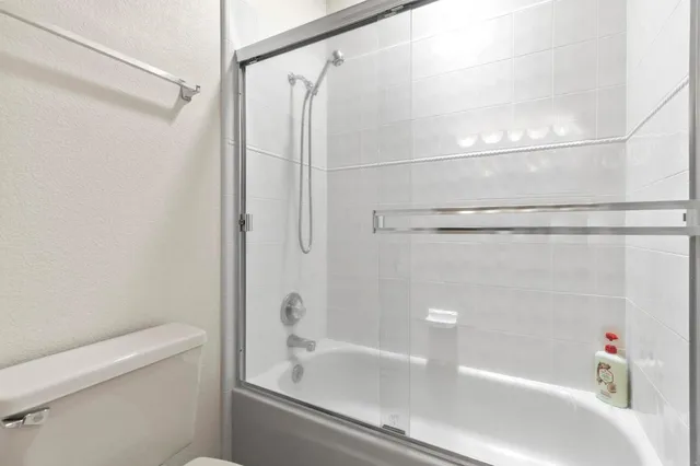 a view of an house with backyard porch and garden