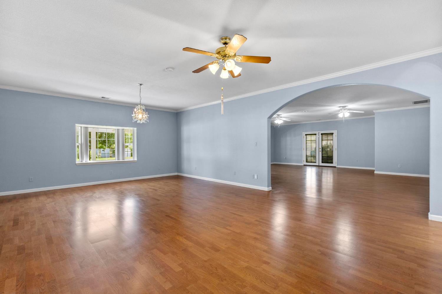 10963 Metteer Road Live Oak, CA 95953 - Photo 62 of 73 a view of an empty room with wooden floor and a window