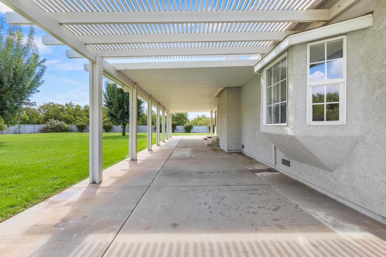 10963 Metteer Road Live Oak, CA 95953 - Photo 66 of 73 a view of an house with backyard porch and garden
