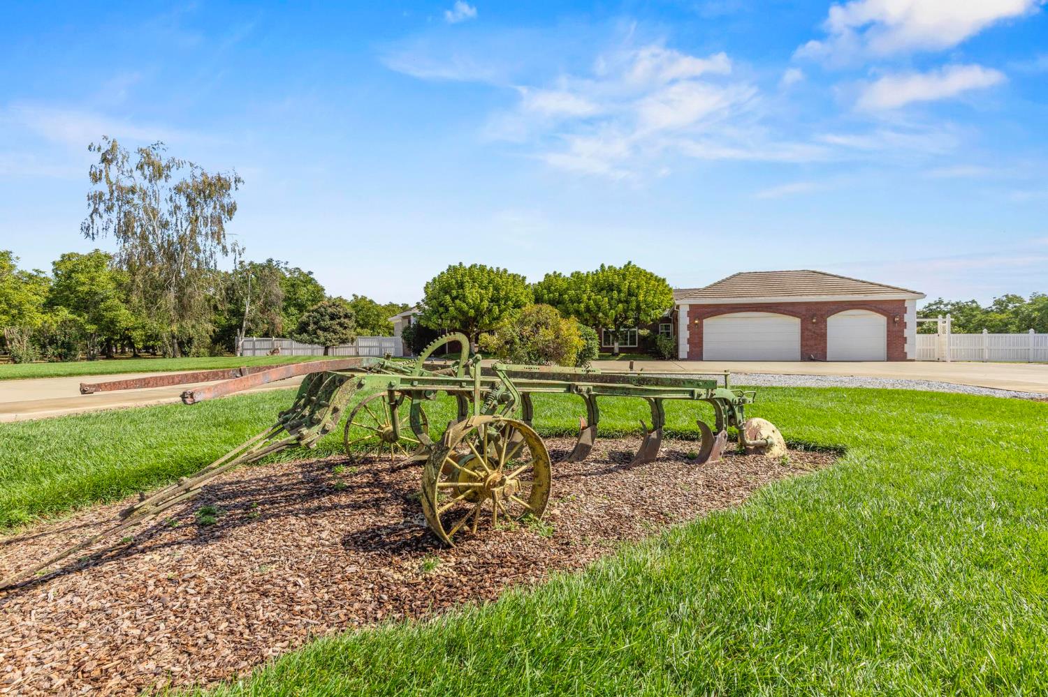 10963 Metteer Road Live Oak, CA 95953 - Photo 70 of 73 a green field with some trees in the background
