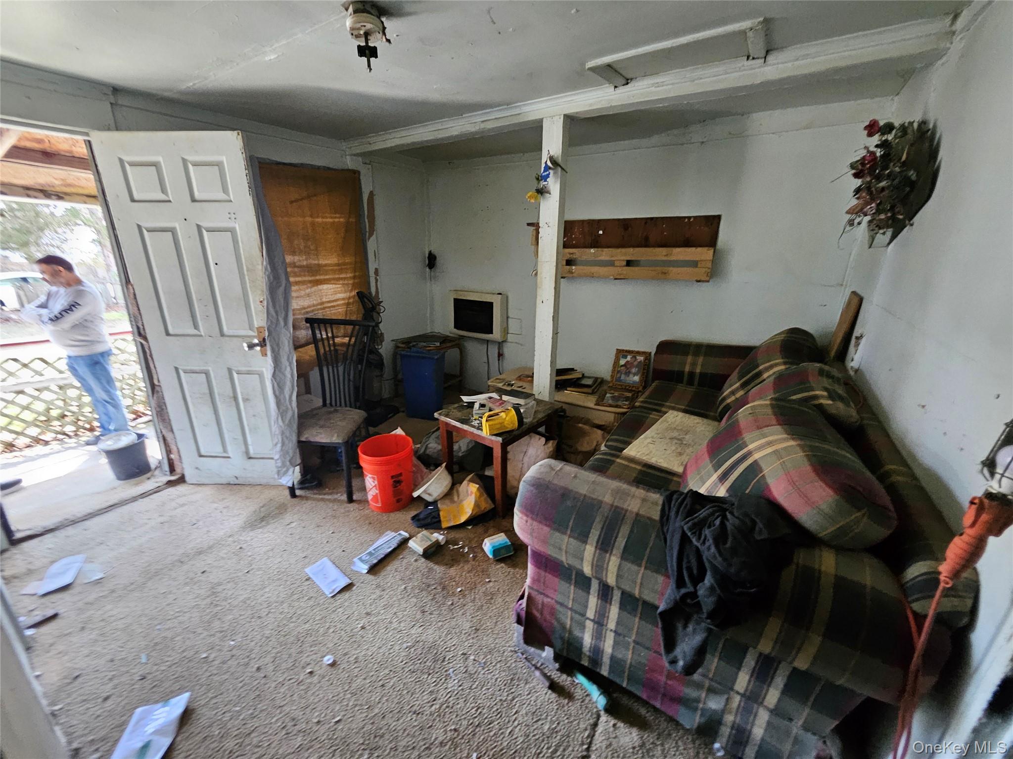 549 Granny Road Medford, NY 11763 - Photo 14 of 37 a bedroom with furniture and a window