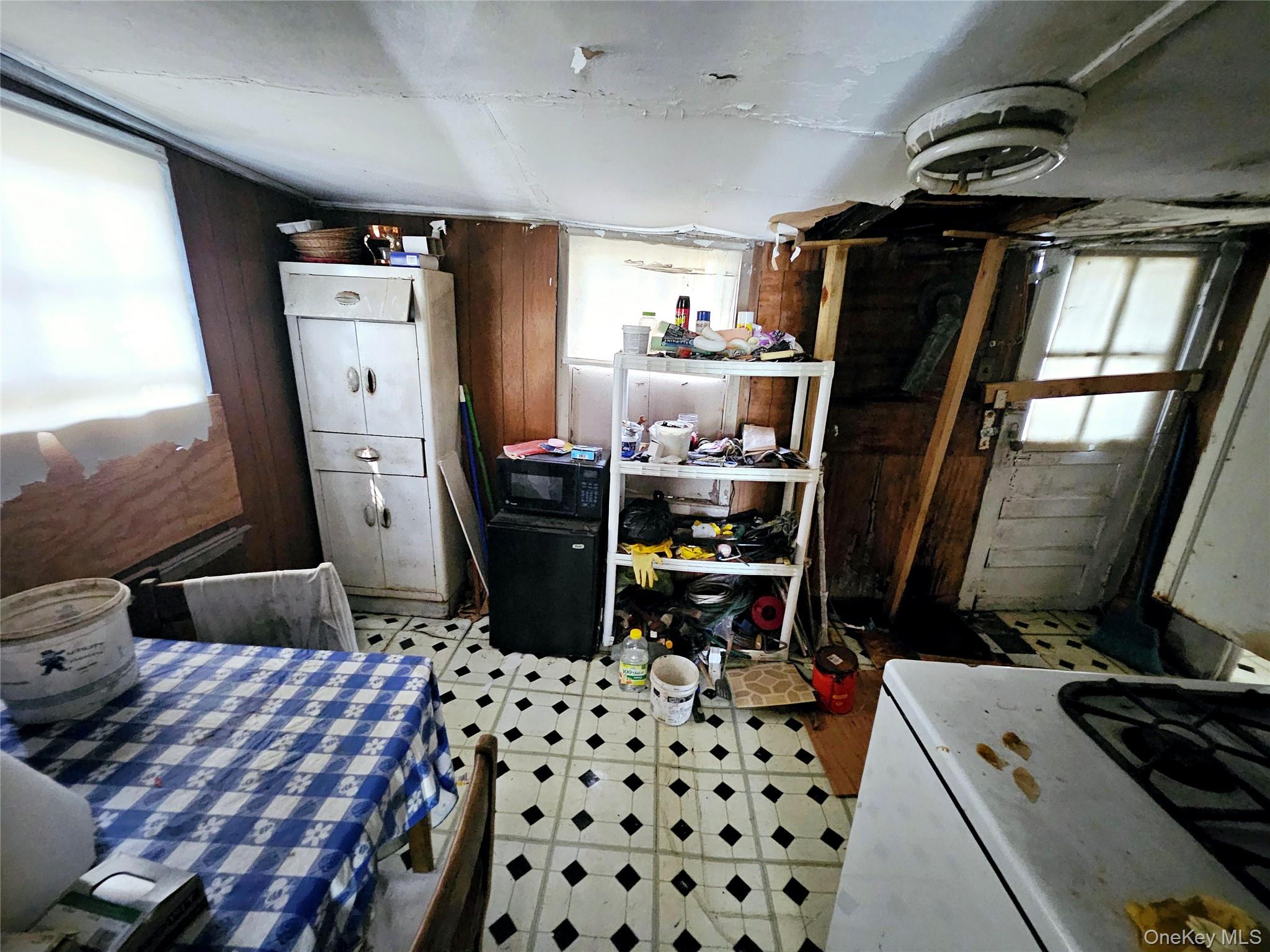 549 Granny Road Medford, NY 11763 - Photo 28 of 37 a bedroom with a bed and wooden floor