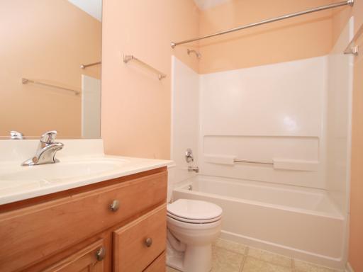 2949 Exeter Court West Dundee, IL 60118 - Photo 13 of 16 a bathroom with a sink a toilet and shower