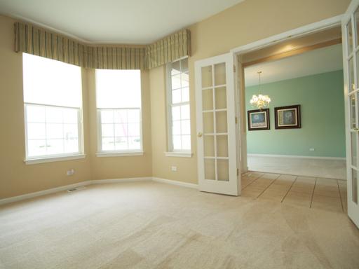 2949 Exeter Court West Dundee, IL 60118 - Photo 4 of 16 a view of an empty room with a window