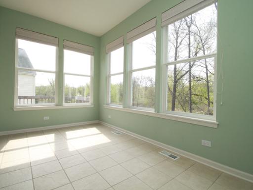 2949 Exeter Court West Dundee, IL 60118 - Photo 6 of 16 a view of an empty room with a window