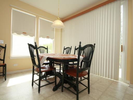 2949 Exeter Court West Dundee, IL 60118 - Photo 7 of 16 a view of a dining room with furniture and window