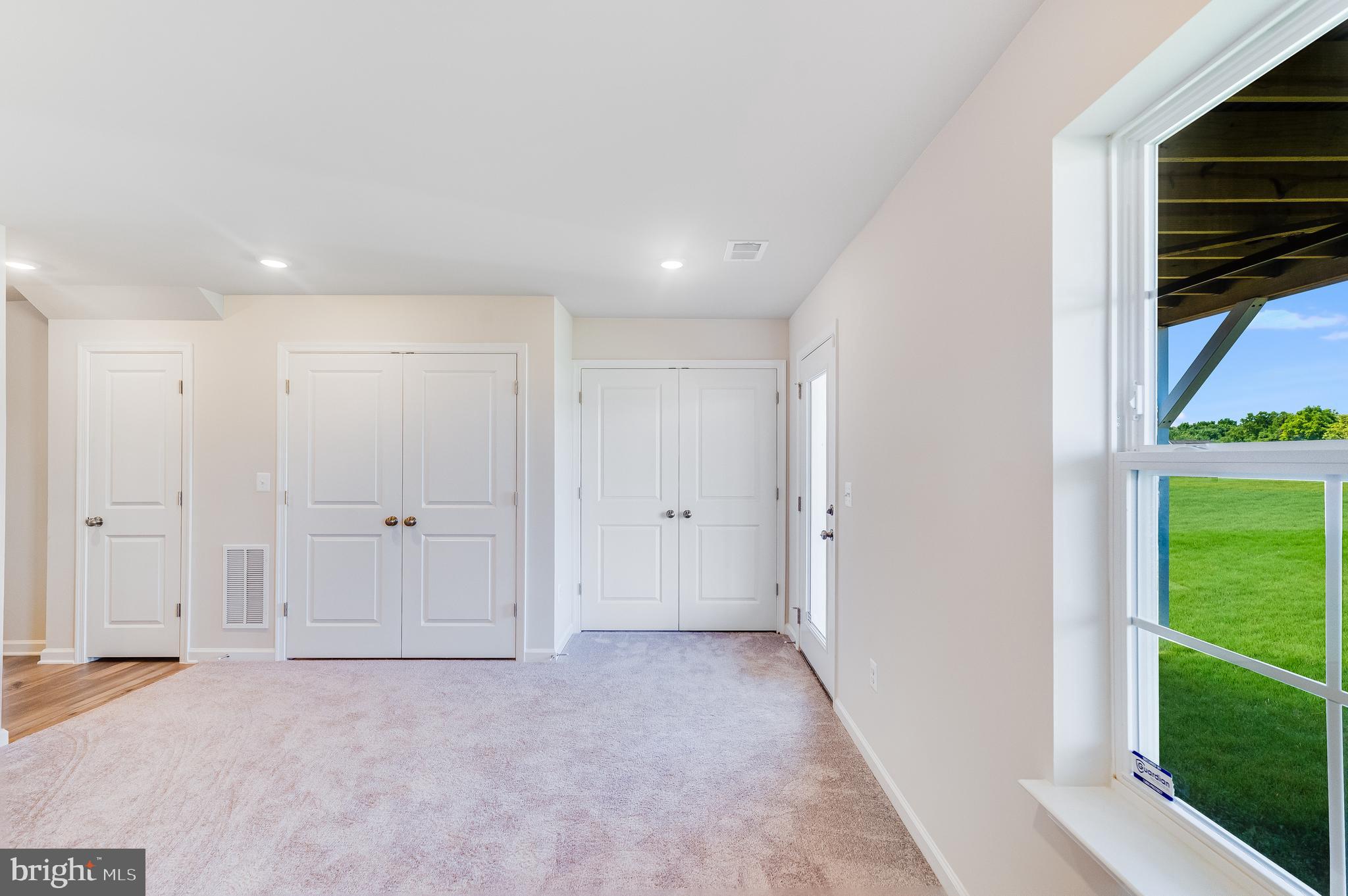 133 Gray Silver Road, Unit LANCASTER Inwood, WV 25428 - Photo 7 of 22 a view of a hallway