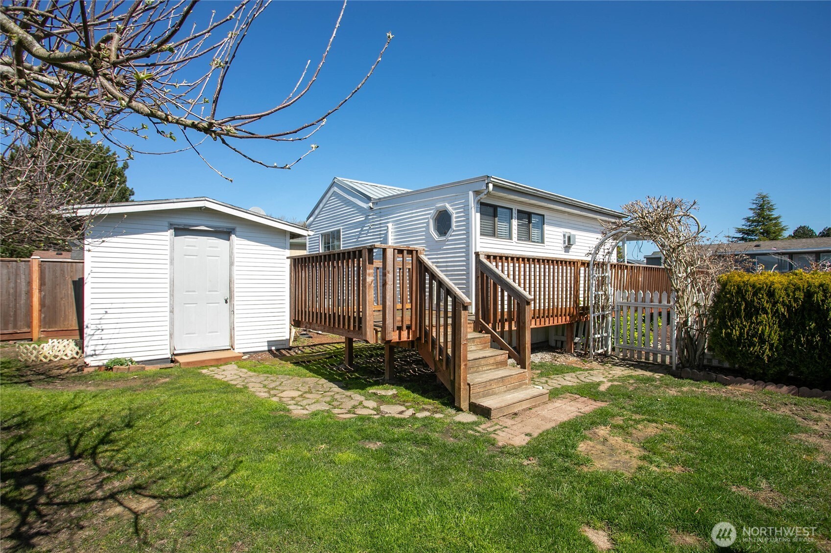 4751 Birch Bay Lynden Road, Unit 129 Blaine, WA 98230 - Photo 22 of 34 a view of a house with a yard