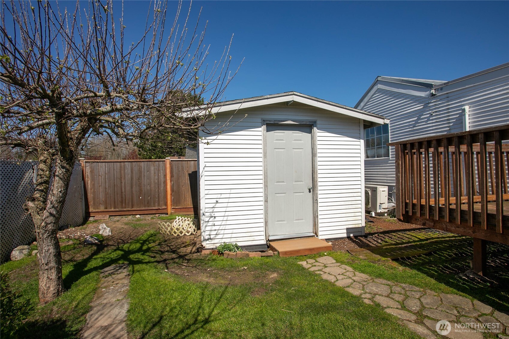 4751 Birch Bay Lynden Road, Unit 129 Blaine, WA 98230 - Photo 23 of 34 a front view of a house with a yard