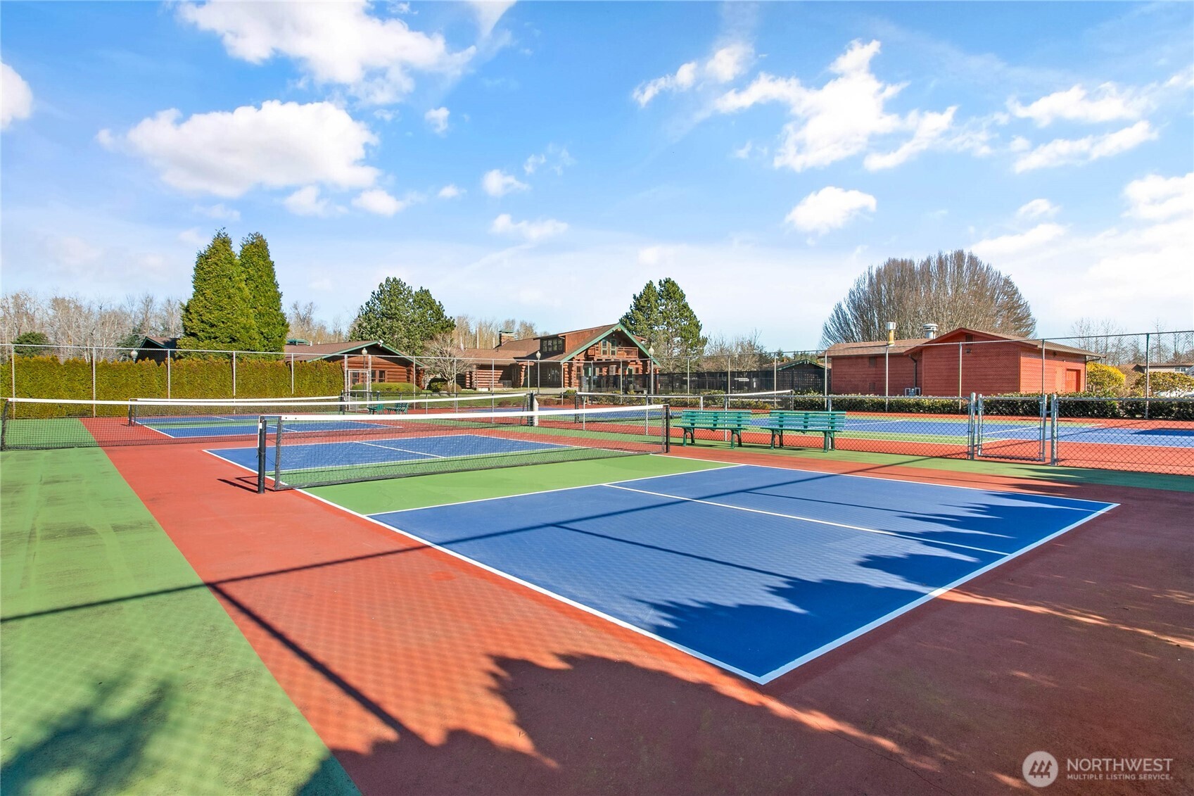 4751 Birch Bay Lynden Road, Unit 129 Blaine, WA 98230 - Photo 27 of 34 a view of an outdoor space and tennis court