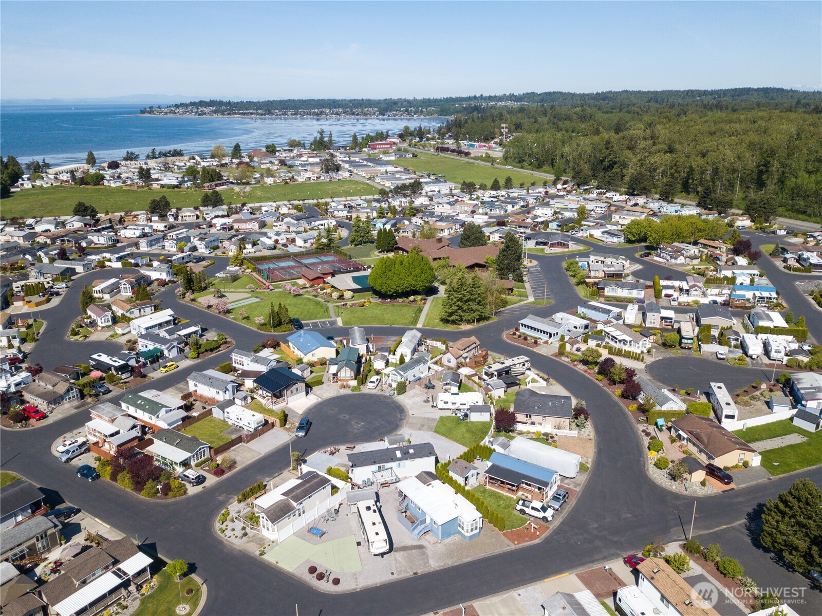 4751 Birch Bay Lynden Road, Unit 129 Blaine, WA 98230 - Photo 32 of 34 an aerial view of residential houses with outdoor space