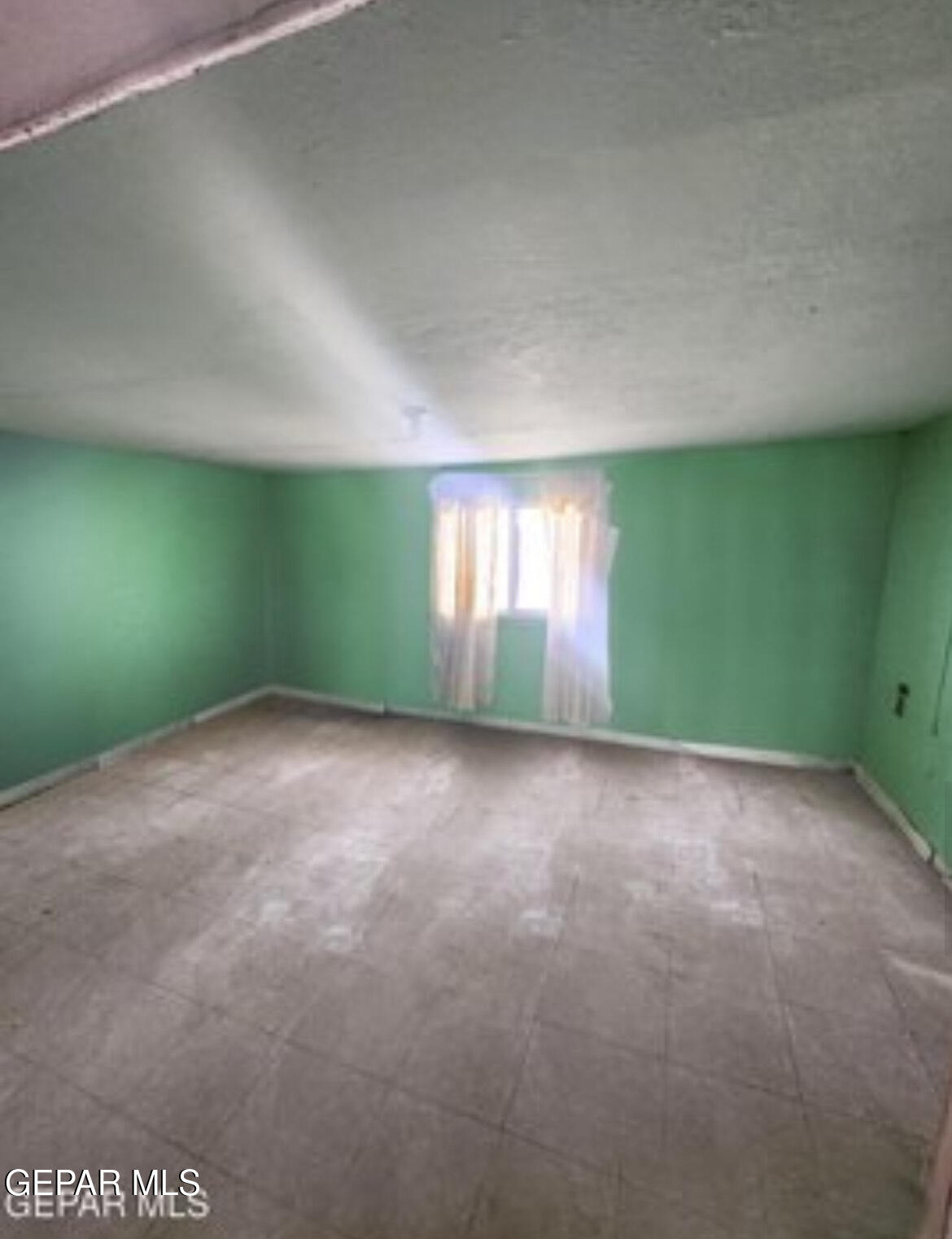 12320 Argentite Street Clint, TX 79836 - Photo 3 of 10 a view of an empty room with windows