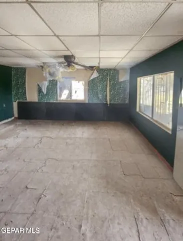 en empty room with windows