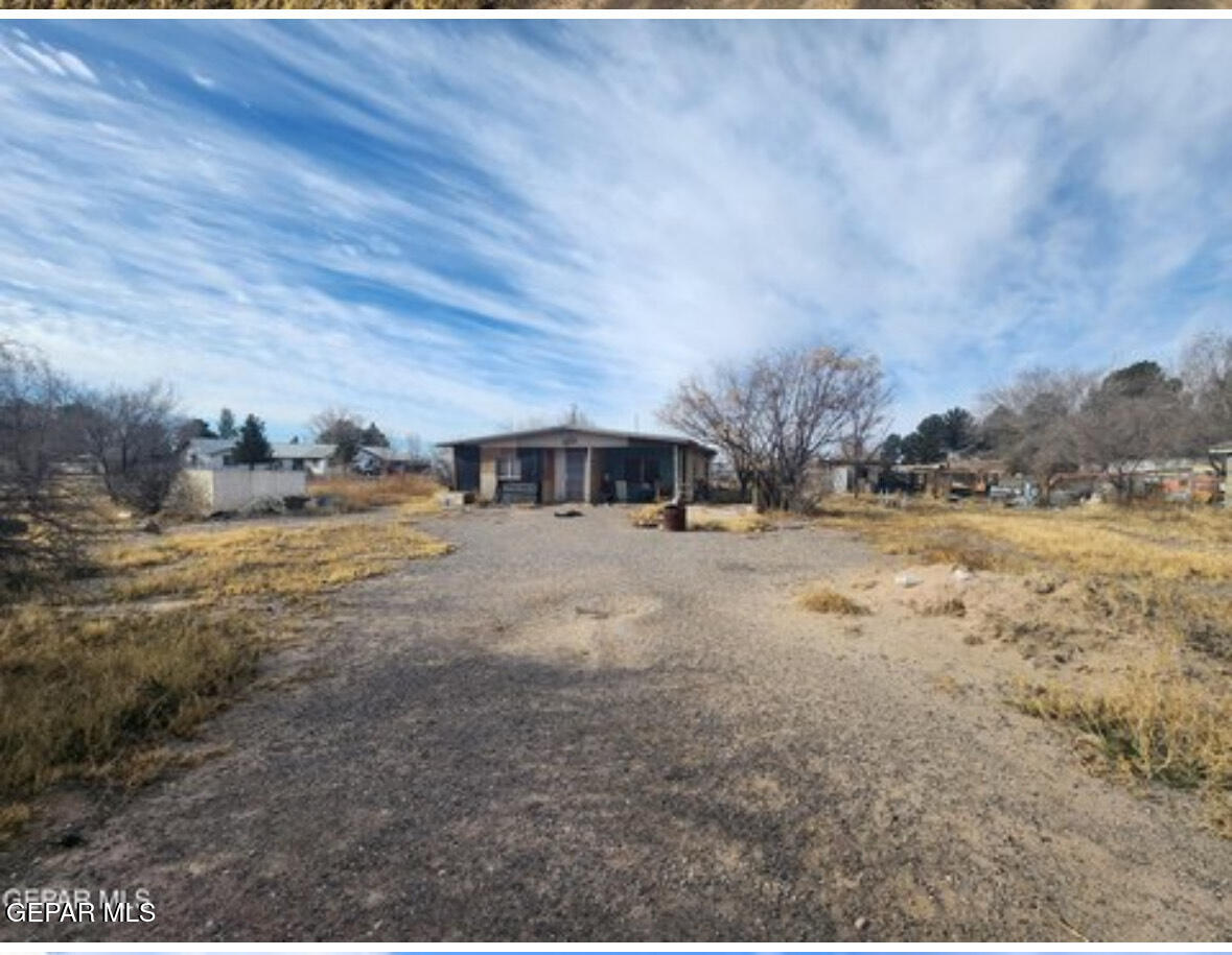 12320 Argentite Street Clint, TX 79836 - Photo 9 of 10 a view of a yard with wooden fence