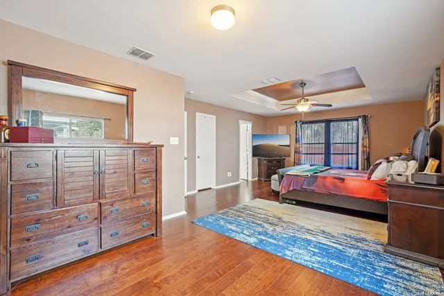 a bed room with a bed and a dresser