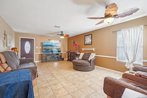 a living room with furniture and a window