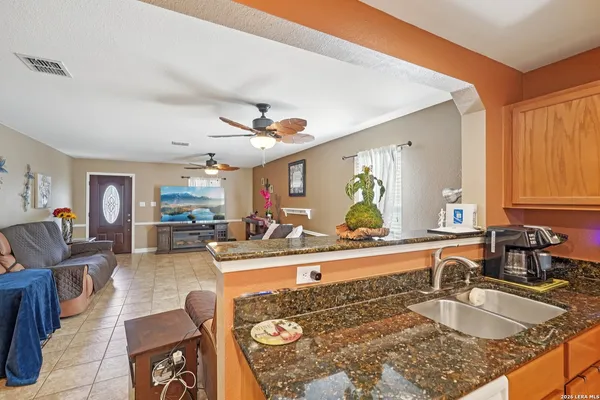 a view of a living room and dining room