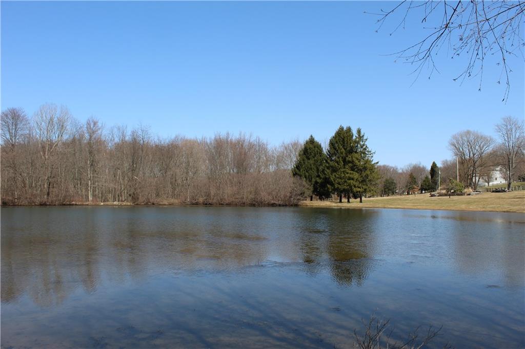 1820 Stoughton Road Slippery Rock, PA 16057 - Photo 18 of 24 a view of a lake with trees in the background
