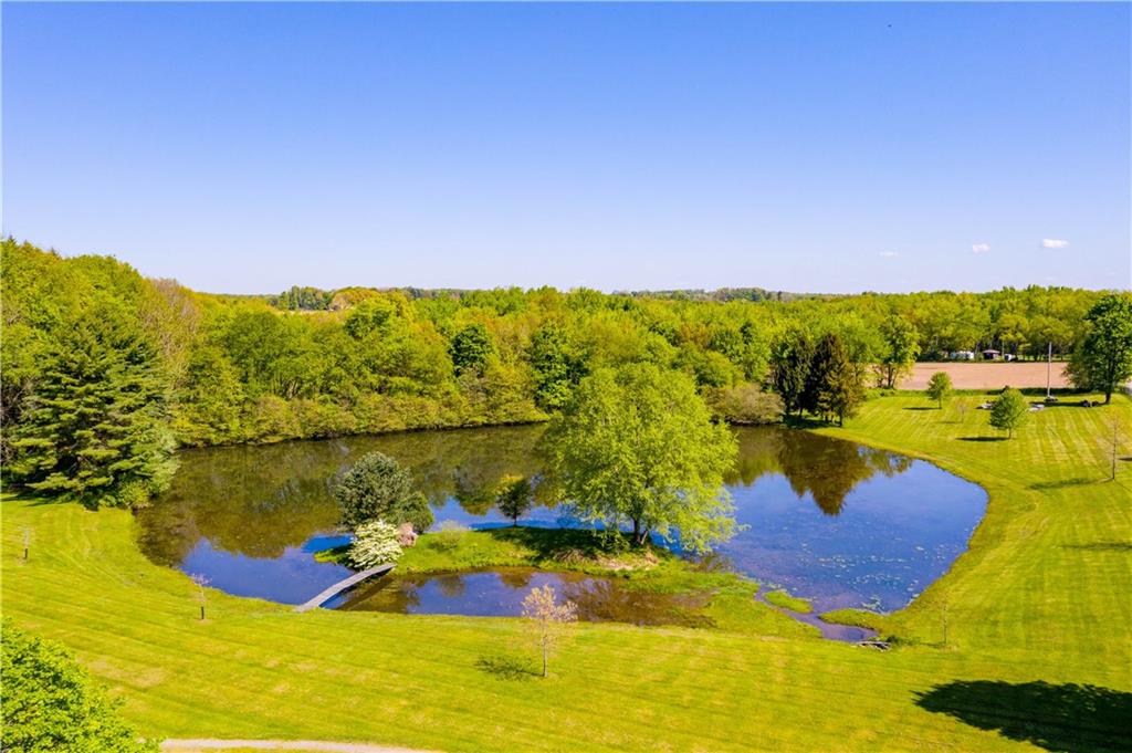 1820 Stoughton Road Slippery Rock, PA 16057 - Photo 4 of 24 a view of a lake with a yard
