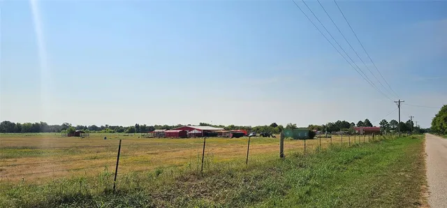a aerial view of residential house with outdoor space