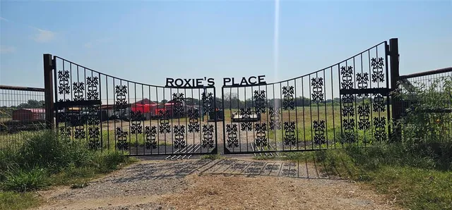 a view of a house with a flat screen tv