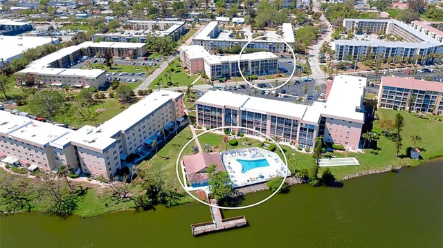 an aerial view of a swimming pool and outdoor space