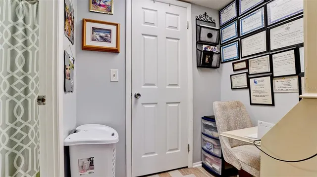 an aerial view of a house with a ocean view