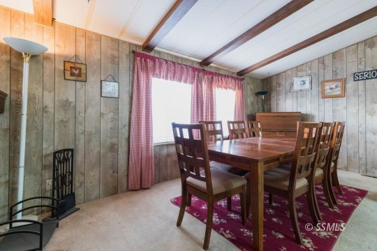 716 West Reeves Avenue Ridgecrest, CA 93555 - Photo 12 of 28 a dining room with furniture and window