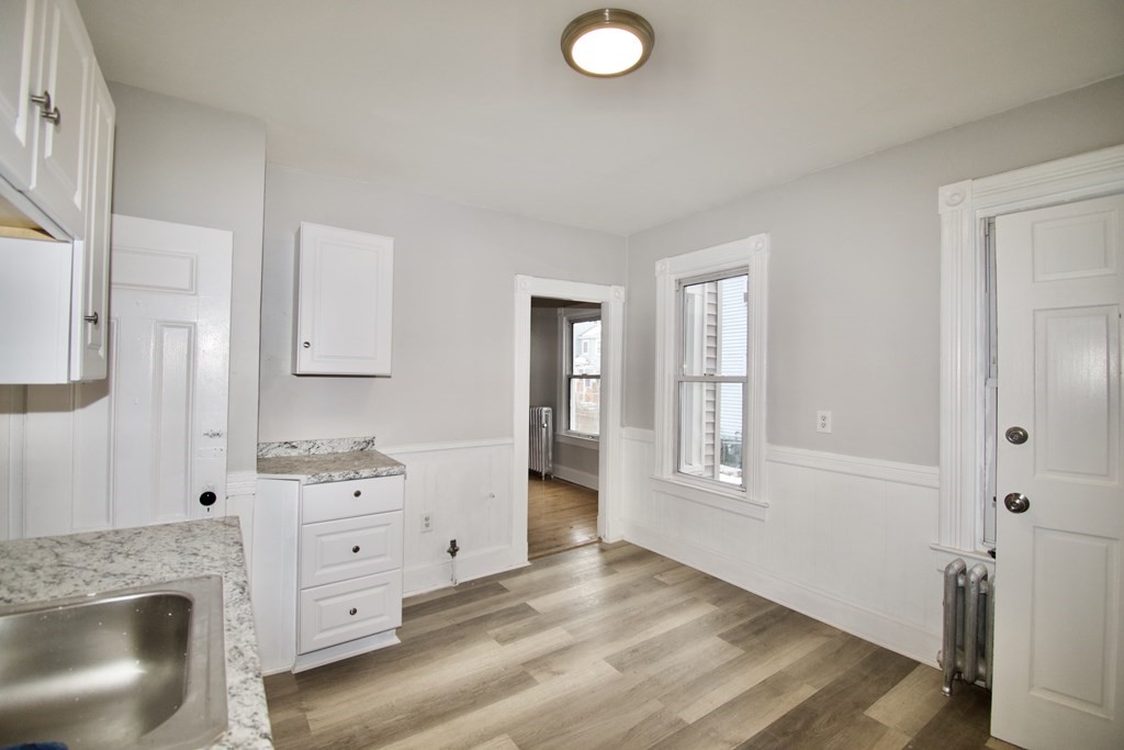72 Malden Street Springfield, MA 01108 - Photo 12 of 25 a view of cabinets and window